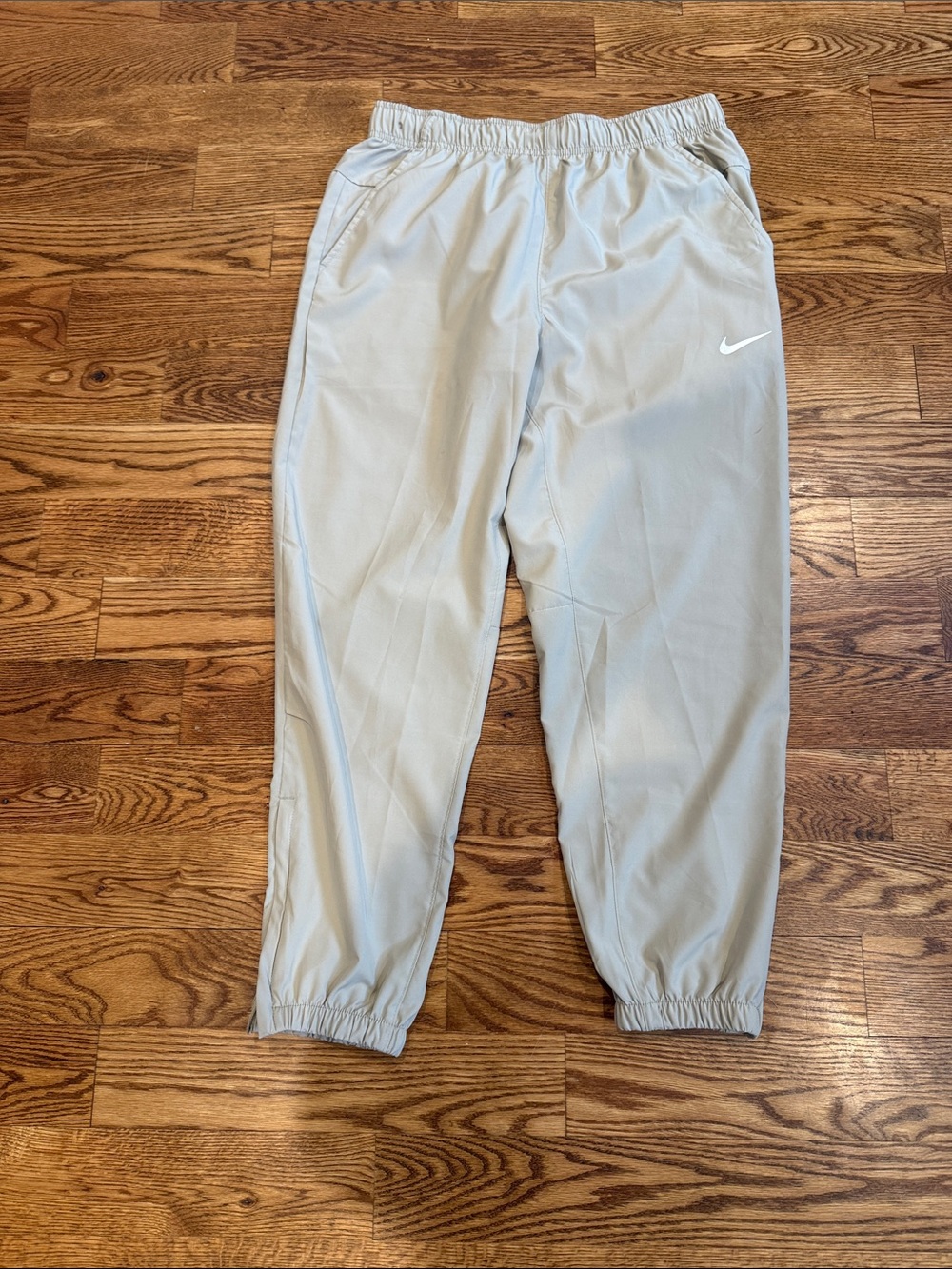 Nike Light khaki Athletic Joggers with White Swoosh